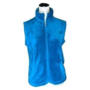 Teal women’s white sierra fuzzy vest size Medium with pockets